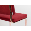 Chaise de repas rouge et cuivre